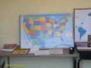Contact plotter's station. There was a US map and World maps where the countries permitted as third party contacts were highlighted in blue. The plots allowed anyone looking inside from the doorway to see where we were making contacts. 